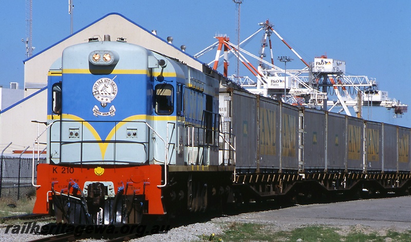 P15056
South Spur Rail K class 210, hauling ANL container wagons, P&O Ports cranes (part), shed (part), North Quay, Fremantle Port, front and side view
