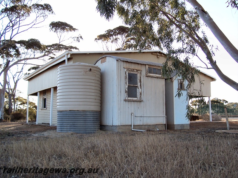 P15082
Railways Barracks, curved roofed small shed at one end, Hyden, LH line, rear and end view.
