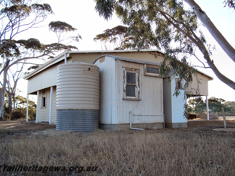 P15082
Railways Barracks, curved roofed small shed at one end, Hyden, LH line, rear and end view.
