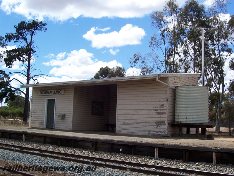 P15088
Station building with water tank, Woodanilling, GSR line, trackside and end view
