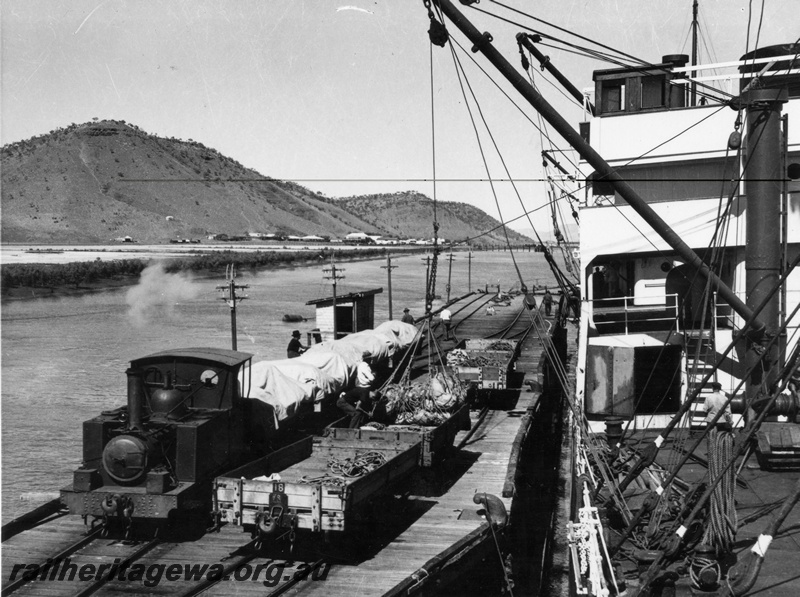 P15109
 'KATE' steam locomotive, Wyndham Meat Works shunter, moving loaded wagons at the wharf as a ship crane loads goods on-board.
