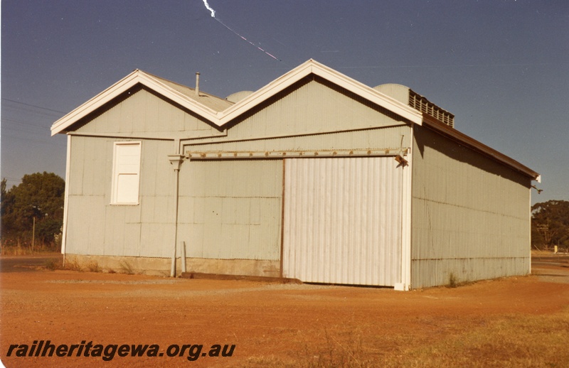 P15155
1 of 2 views of the disused goods shed at Guildford with the tracks removed, ER line, west end and trackside view
