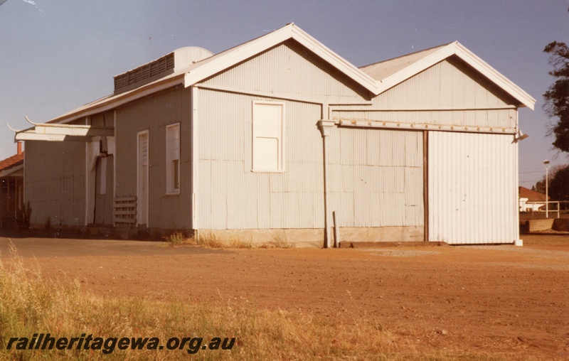 P15156
2 of 2 views of the disused goods shed at Guildford with the tracks removed, ER line, roadside and east end view
