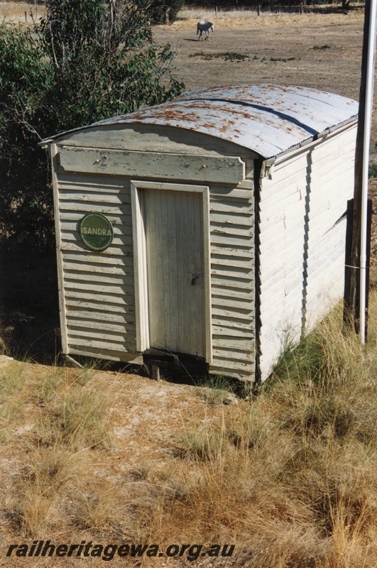 P15172
3 of 3 views of the round roof staff cabin at Isandra, PN line, elevated view of the front and roof of the shed, blank nameboard on the front of the shed above the door, 
