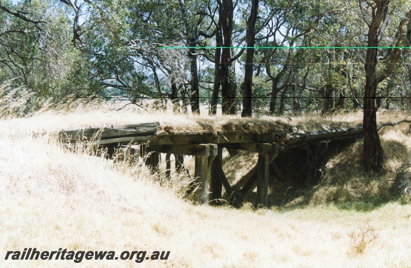 P15176
Derelict short trestle bridge on the abandoned line fro Roelands, SWR line to the Roelands Quarry to the east of the siding at Roelands
