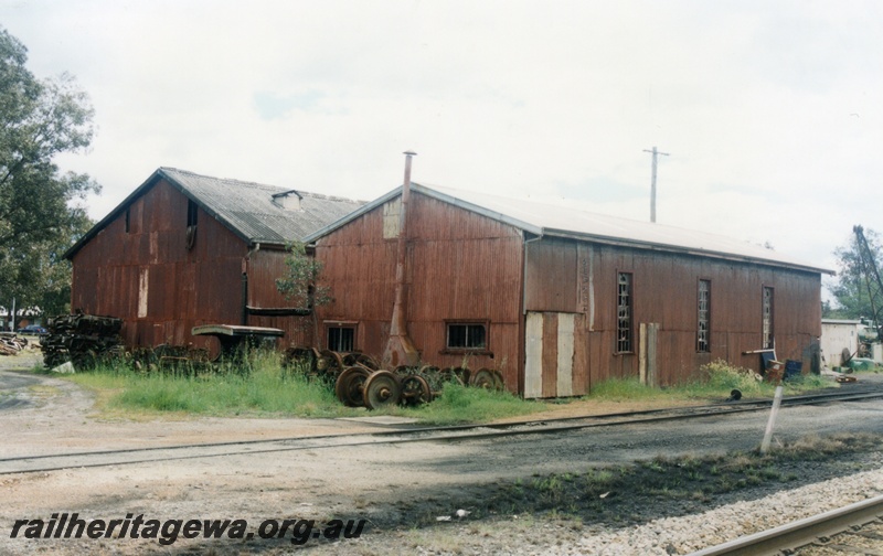 P15189
5 of 6 images of showing the Hotham Valley Railway's use of the facilities at Pinjarra, SWR line. Loco shed and carriage shed, rear and trackside view
