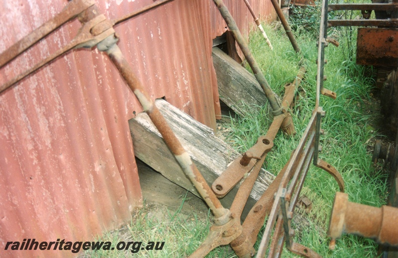 P15190
6 of 6 images of showing the Hotham Valley Railway's use of the facilities at Pinjarra, SWR line. Supports for the internal buffer stops protruding through the rear wall of the loco shed, view of the outside of the shed
