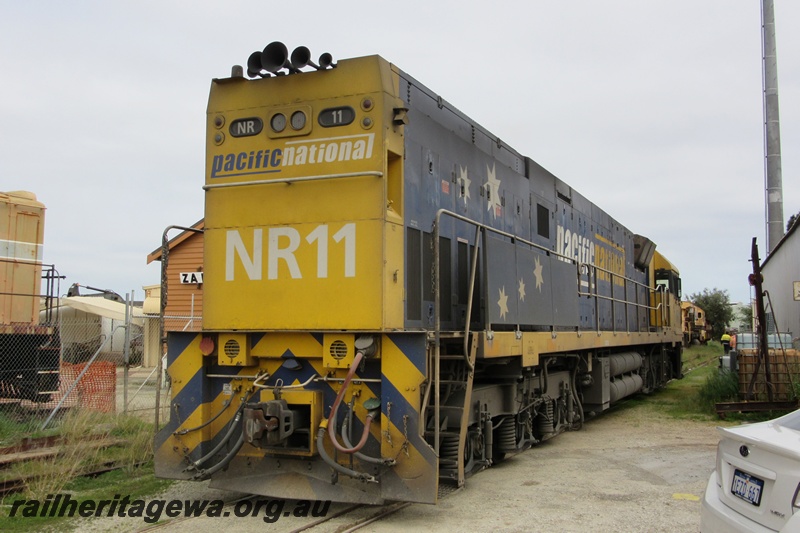 P15203
Pacific National NR class 11 traversing the line through the Rail Transport Museum en route to UGL's plant, end and side view.
