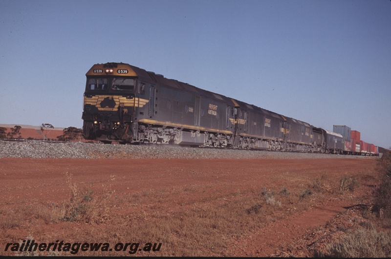 P15208
Freight Australia G class 539 and two other G class locos heading an intermodal train between between Golden Ridge and Parkeston, TAR line.
