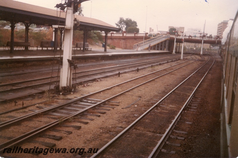 P15248
Perth city station, signal, bracket signal, platform, ramp, canopy, seats, overhead bridge, view from tour train about to depart 
