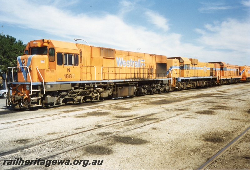 P15276
N class 1880, A class 1510, both in Westrail orange and blue livery, A class 1507 and A class 1506, both in Westrail orange and blue livery, Forrestfield, front and side views
