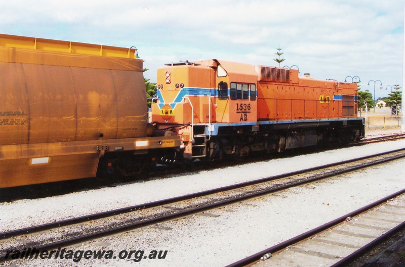 P15282
AB class 1536, in Westrail orange and blue colour scheme but with Australia Western Railroad initials and swan logo, on goods train, Albany, GSR line
