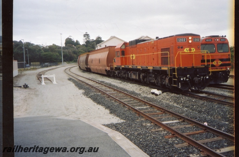 P15285
Australian Railroad Group diesel No 1202, formerly A class 1511, on woodchip train, ARG diesel No 1605, Albany, GSR line
