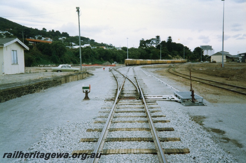P15306
Rake of goods wagons, points, lever, indicator, sidings, platform, trackside buildings, Albany yard, GSR line
