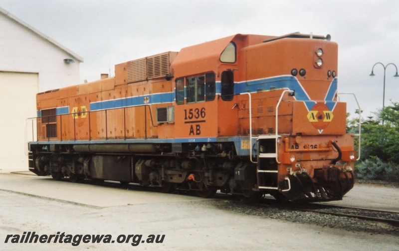 P15324
AB class 1536, in Westrail orange and blue colour scheme but with Australia Western Railroad initials and logo, Albany, GSR line, side and end view
