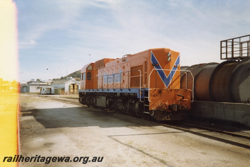 P15336
AA class 1517 diesel locomotive at the Albany fuel point. GSR line, Locomotive depot in background. Rear and side view of locomotive.
