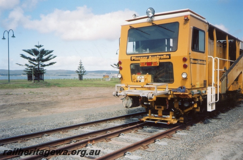 P15373
John Holland 'Plasser' ballast tamping machine about to commence work on refurbished track. GSR line. 
