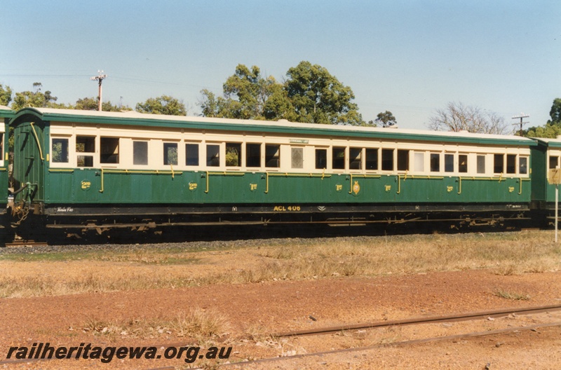 P15418
ACL class 408 carriage, green and cream livery, mainly a side view, Boyanup, 
