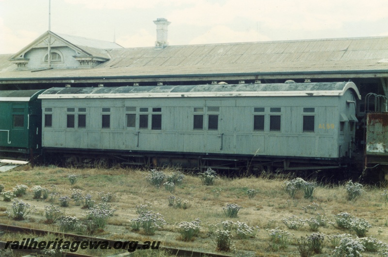 P15424
AL class 59, ex AF class 59 suburban carriage, side and end view showing end windows, old Northam station building, ER line, in preservation.
