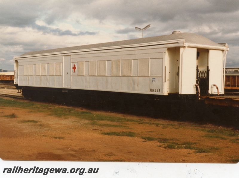 P15426
AQA class ambulance carriage, all over white livery with a red cross on the side, side and end view, Midland
