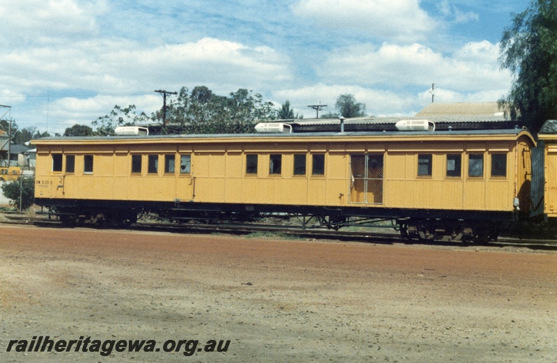 P15427
VW class 5123 workers carriage, ex ACM class 404 and ACL class 404, yellow livery, mainly a side view, old Northam yard
