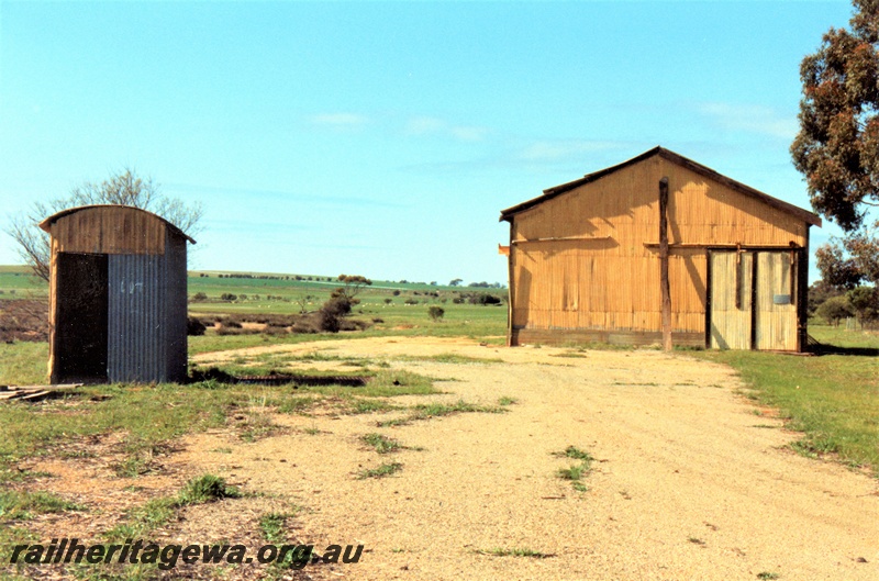 P15468
Goods shed and a weigh bridge shed, at the abandoned railway precinct at Grass Valley, EGR line, end on view of the structures
