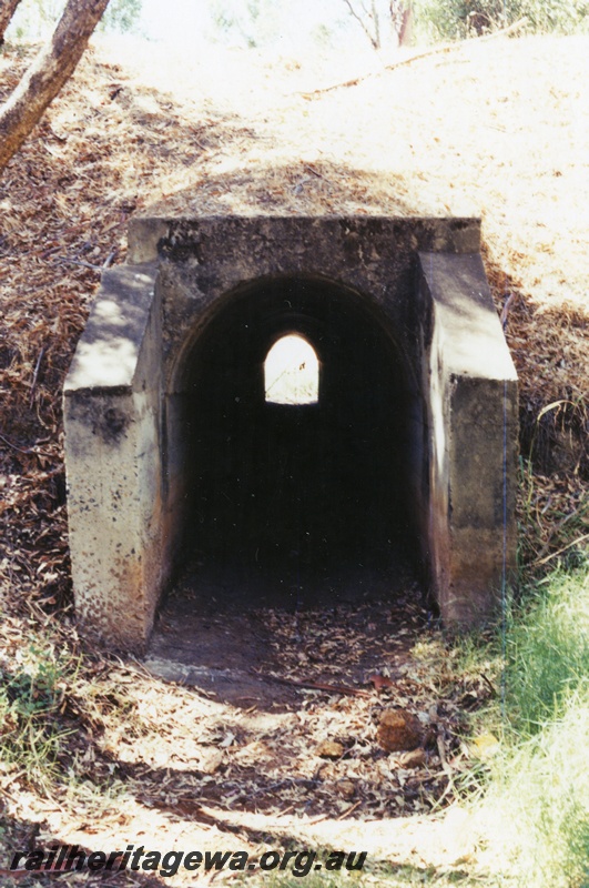 P15476
Concrete culvert under the abandoned yard at Wooroloo, ER line, view through the culvert
