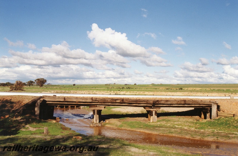 P15478
Low three span trestle bridge on the abandoned line ten kilometres west of Meckering, EGR line, side view
