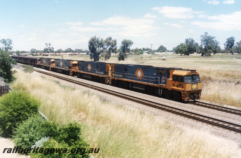 P15521
National Rail NR class 117 heads three other NR classes on a northbound interstate freight train through Hazelmere, view along the four locos.
