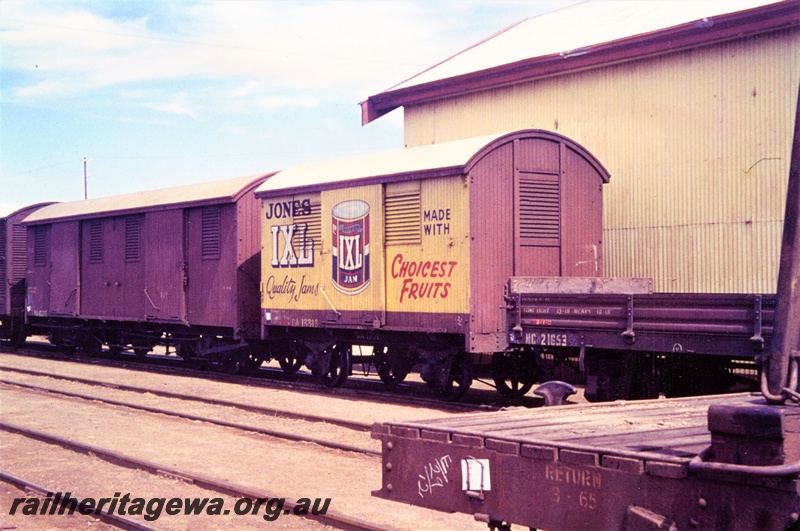 P15571
DA class 13316 four wheel van, HC class 21653 and an unidentified VA class bogie van, Subiaco yard, ER line, Advertisement for 