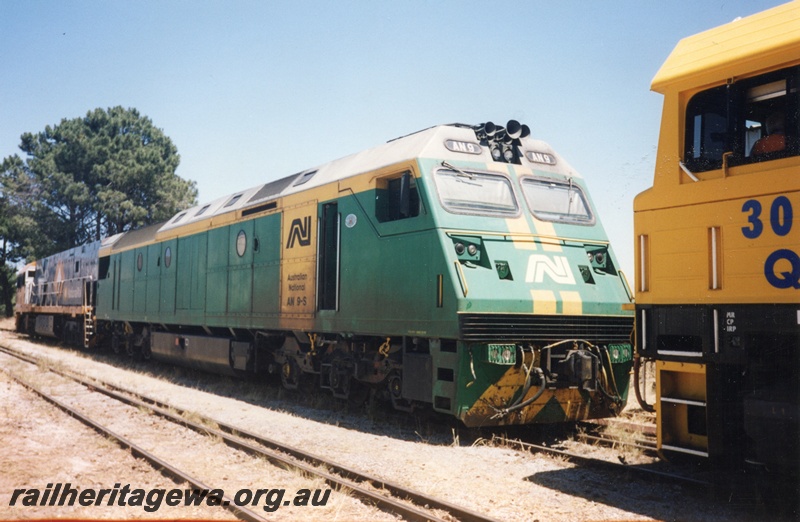 P15592
Australian National AN class 9-S in the green livery with yellow stripes on the nose and a yellow stripe and panel on the side, Rail transport museum, Bassendean, side and front view
