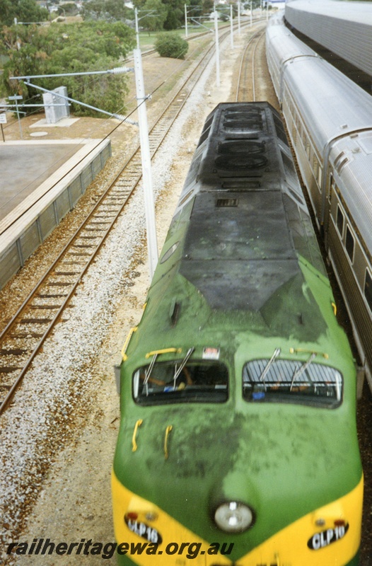 P15621
Australian National CLP class 16 in the green and yellow livery, East Perth terminal, running around its train, shows roof detail 
