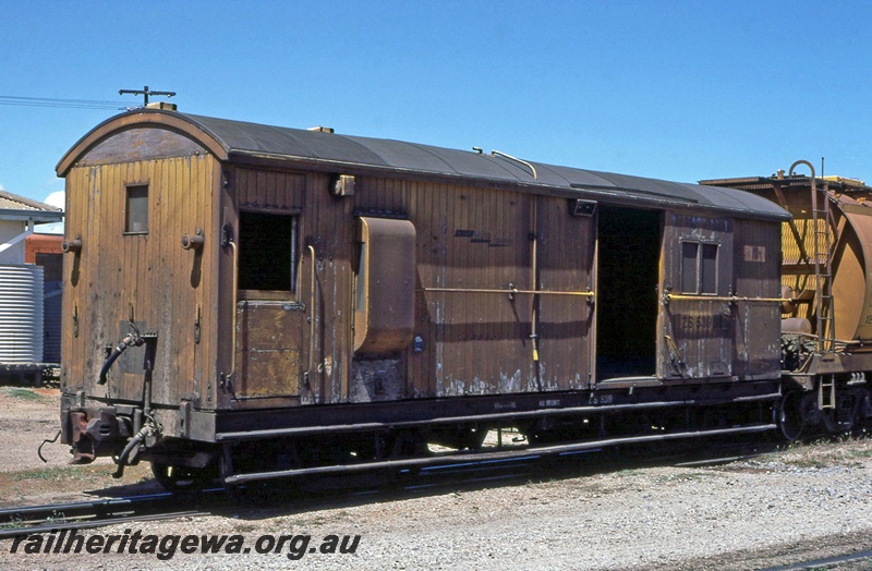 P15642
ZS class 539 brakevan with knuckle couplers, Westinghouse brakes and a radio equiped logo, in a very weathered all over Westrail yellow livery, Geraldton, NR line, guards end and side view
