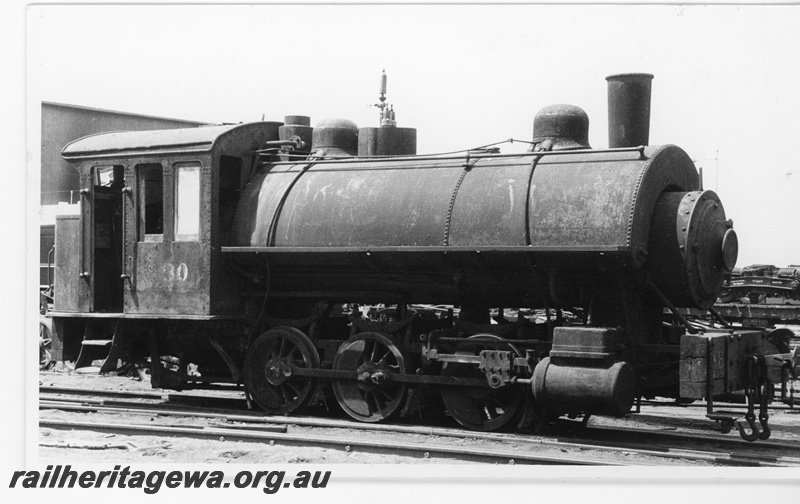 P15662
Commonwealth Railways (CR) NB class 30, 0-6-0 saddletank loco, located in South Australia, side and front view.
