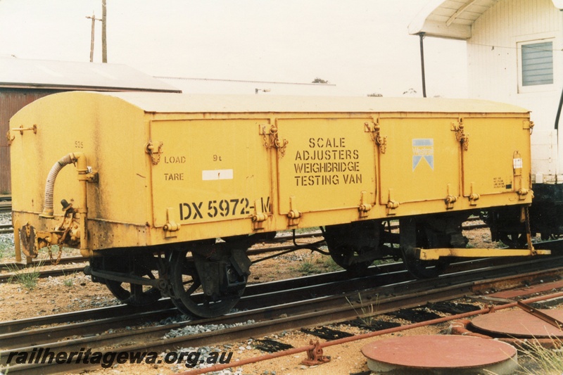 P15670
DX class 5972-W weighbridge testing van in yellow livery coupled to VS class 5077 scale adjusters van in white livery, Pinjarra, SWR line, brake lever side and end view
