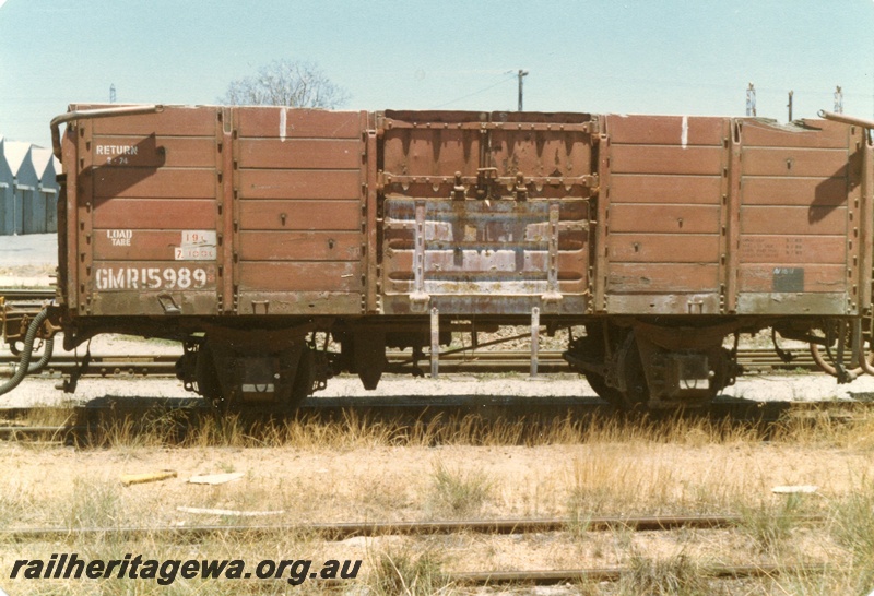 P15721
GMR class 15989, four wheel medium sided wagon with Victorian Railways style ridge poles, brown livery, Welshpool, non brake lever side view
