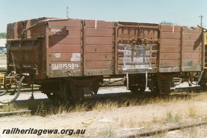 P15722
GMR class 15989, four wheel medium sided wagon with Victorian Railways style ridge poles, brown livery, Welshpool, end and non brake lever side view
