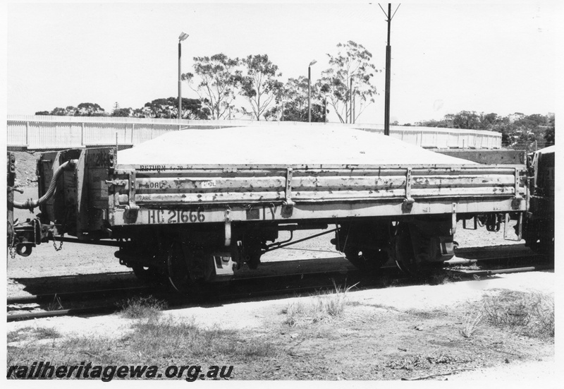 P15735
HC class 21666 four wheel low sided wagon with a load of blue metal dust, yellow livery, York, GSR line, end and non brake lever side view 
