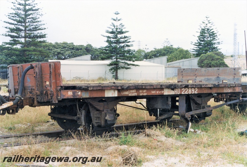 P15739
HD class 22892, four wheel flat wagon with end bulkheads, brown livery, Robbs Jetty, end and brake lever side view

