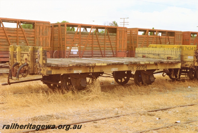 P15743
HDA class four wheel flat wagon with end bulkheads, yellow livery, Bassendean 