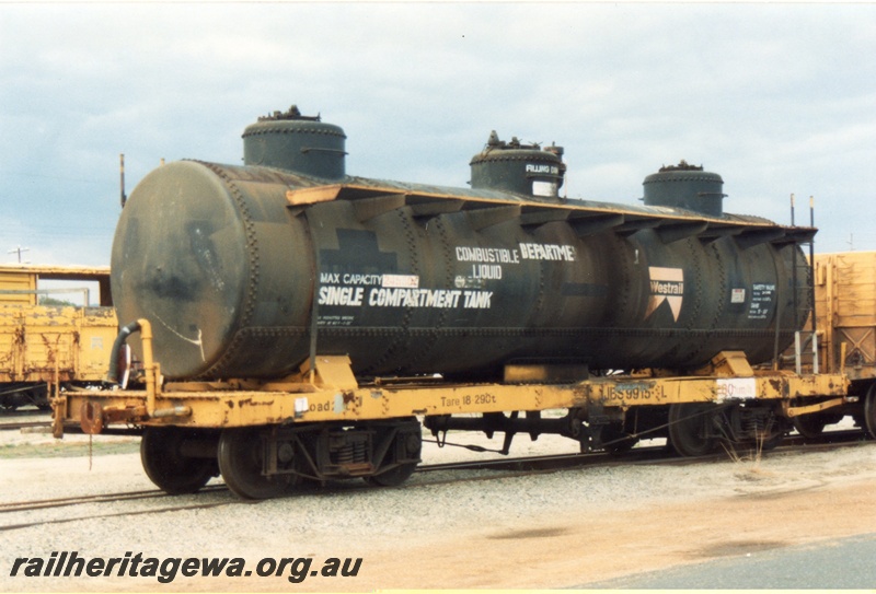 P15750
JBS class 9915-L bogie tank wagon, black three dome tank on a yellow underframe, Midland, end and side view
