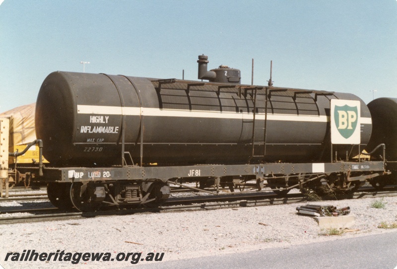 P15765
JF class 81 bogie tank wagon, overall black livery with a horizontal white stripe, 