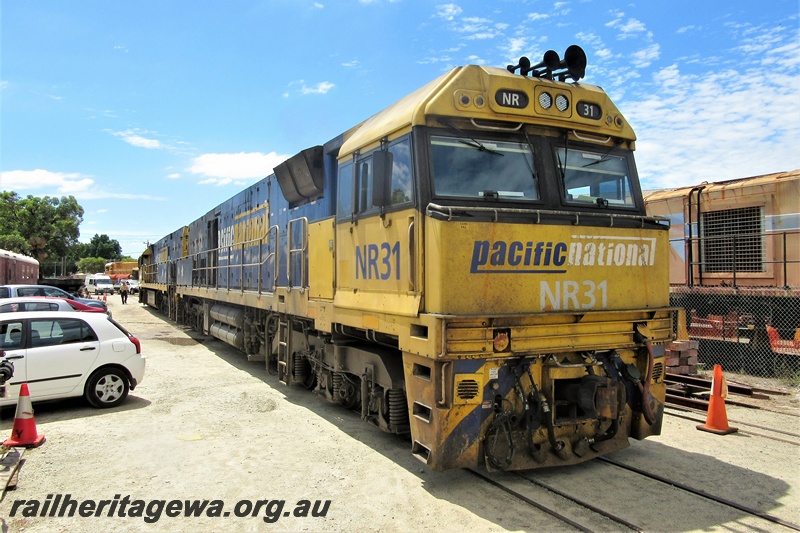 P15767
Pacific National NR class 31 passing through the site of the Rail Transport Museum heading for UGL's site, Bassendean, side and front view.
