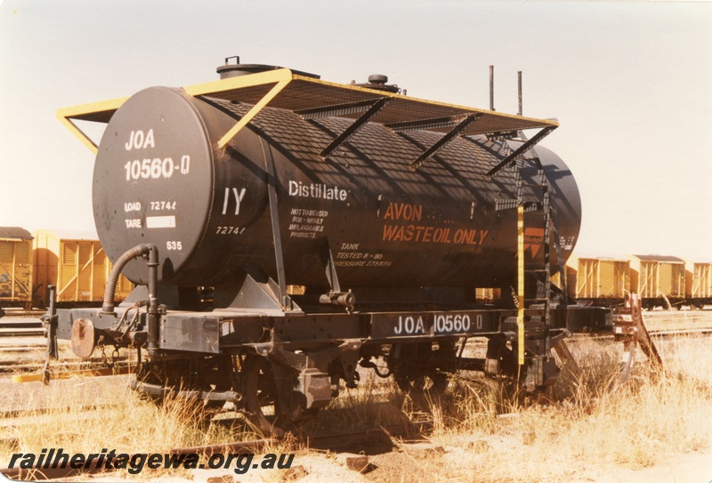 P15773
JOA class 10560-Q four wheel tank wagon, black livery with an orange Westrail motif on the side, 