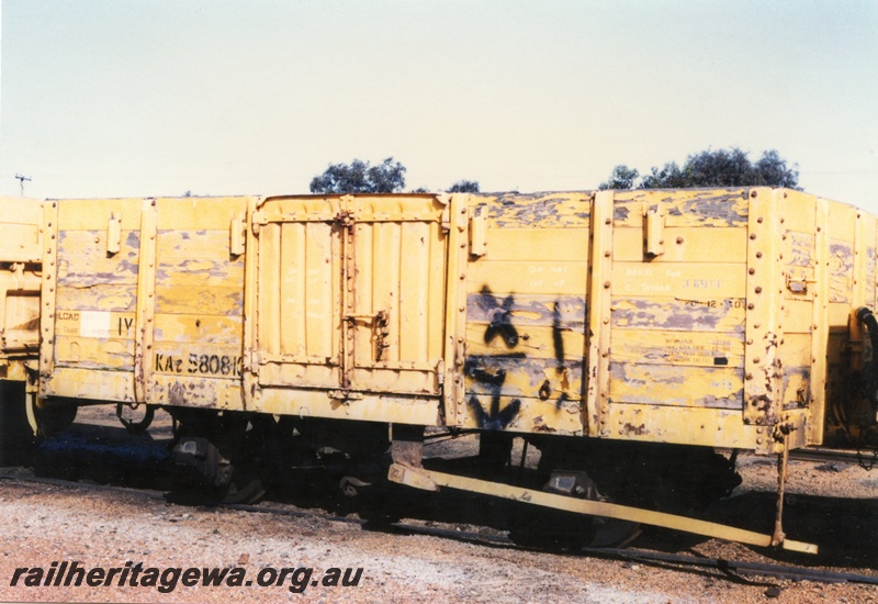 P15781
KA class 5808-A four wheel open wagon, yellow livery, Pinjarra, SWR line, brake lever side and end view
