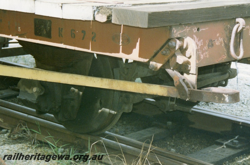 P15799
3 of 5 views of NFA class 22849 four wheel flat wagon being used as a match truck for a steam crane at Midland, brown livery but with a yellow brake lever, side and end view of the brake lever and ratchet
