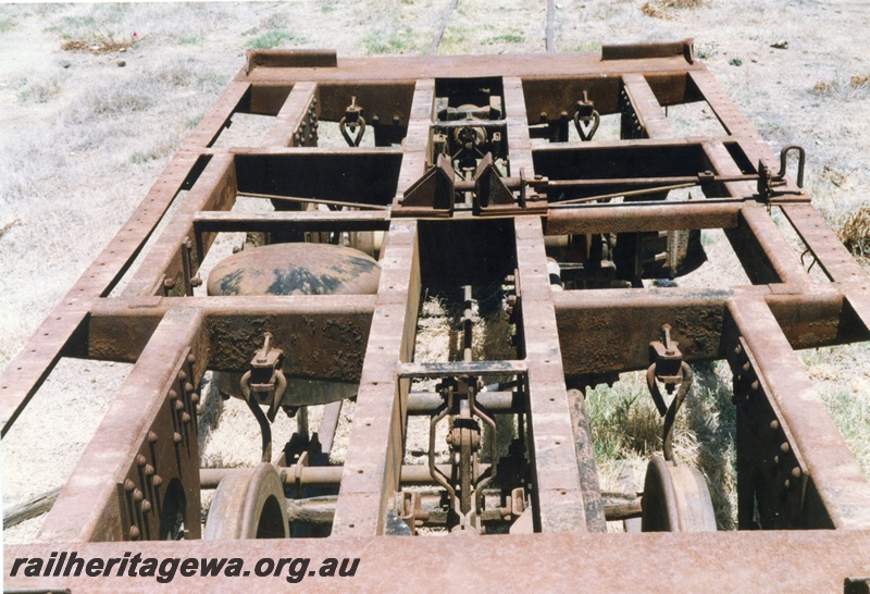 P15807
NW class 21513 four wheel open deck flat wagons for transporting iron ore containers, yellow livery, old Northam Yard, view along the open deck
