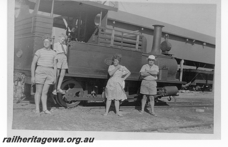 P15811
H class 18, Bunbury, rear and side view, group of four people posing in front of the loco
