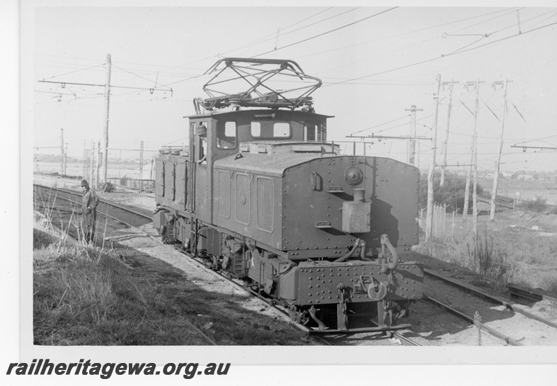 P15825
SEC electric loco N0. 1, under power at East Perth, side and front view
