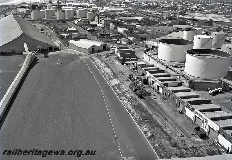 P15847
Tank wagons being filled at BP's facility, North Fremantle, elevated view from the grain silo, note the capstans in the yard. C1963
